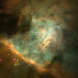Des nuages de gaz et de poussire entourant de jeunes toiles dans la Nbuleuse d'Orion